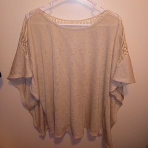 Short sleeved winged top